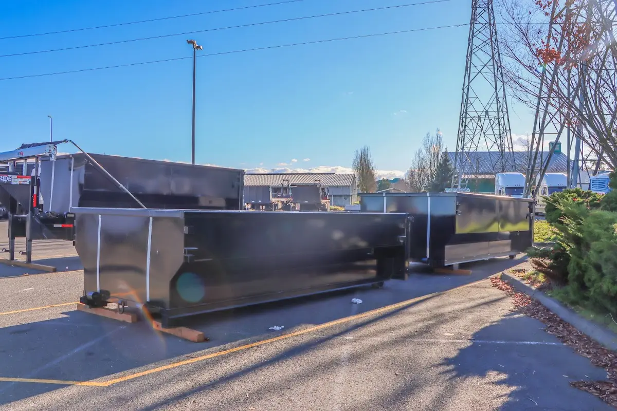 Roll-off dumpster ready for waste disposal at job site for 2 Yard Dumpster Rental in Athol
